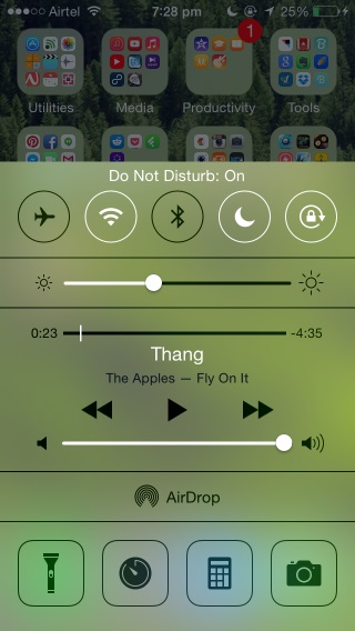 Swipe up to open Control Center and toggle Do Not Disturb mode