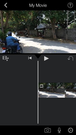 Tap your video, select a point to clip and then swipe down to cut it there
